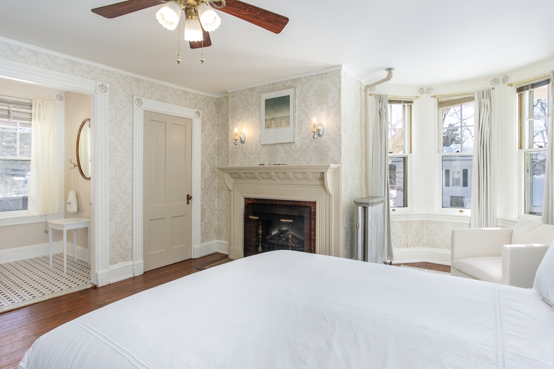 spacious room with plush bedding