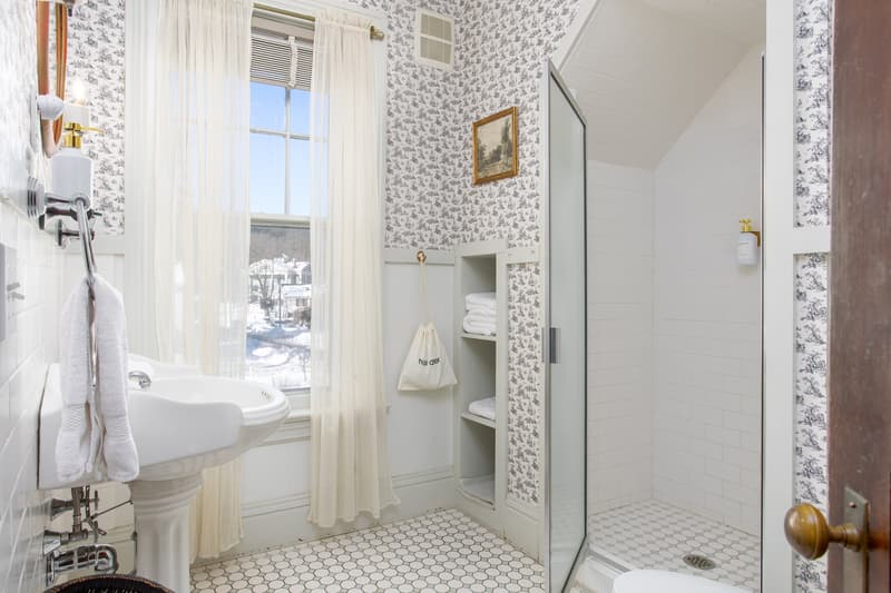 shared bathroom with shower