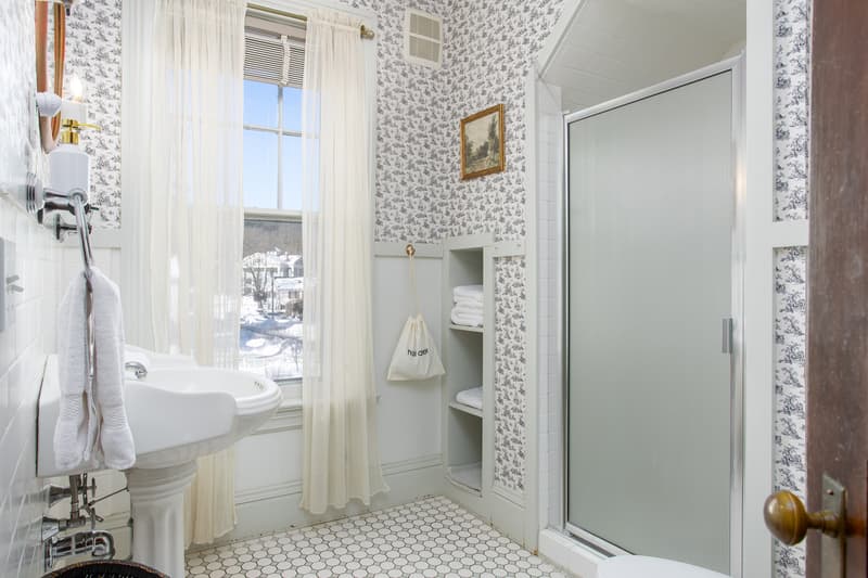 shared bathroom with shower