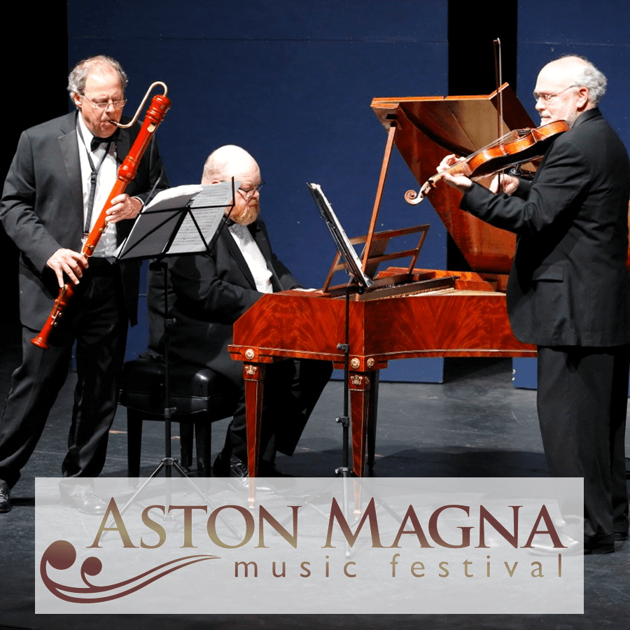 A trio of musicians performing together on stage, featuring a violinist, a pianist, and a player with a woodwind instrument.