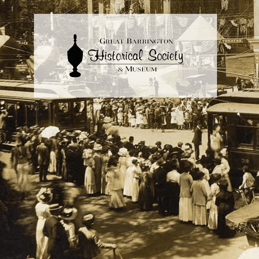 A vintage photo of a large crowd at a streetcar station, overlaid with the Great Barrington Historical Society & Museum logo.