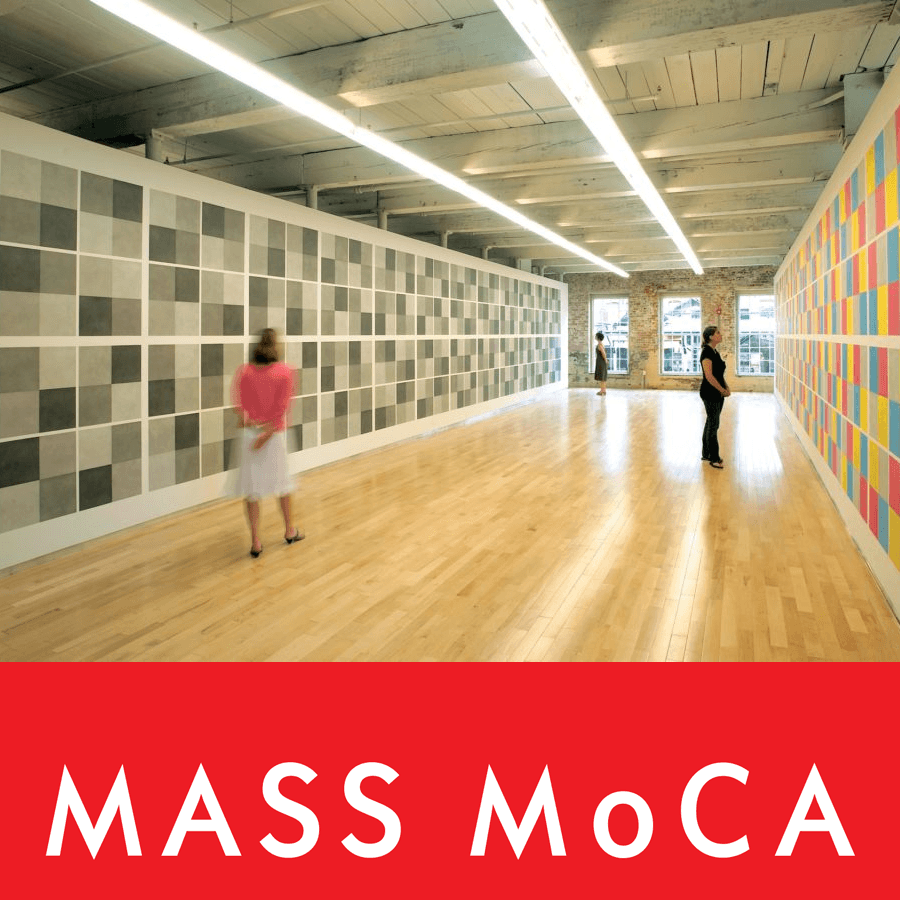 Visitors explore contemporary art in a spacious, well-lit gallery at MASS MoCA.